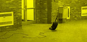 vacuum cleaner in high school corridor